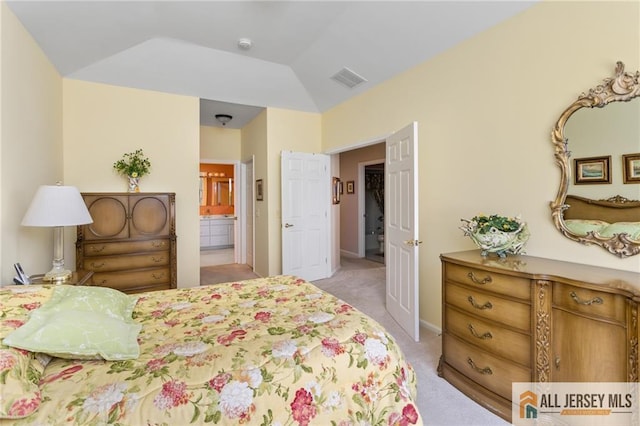 12 Wellfleet St, Monroe, NJ 08831 - bedroom featuring light colored carpet, vaulted ceiling, ensuite bathroom, and baseboards