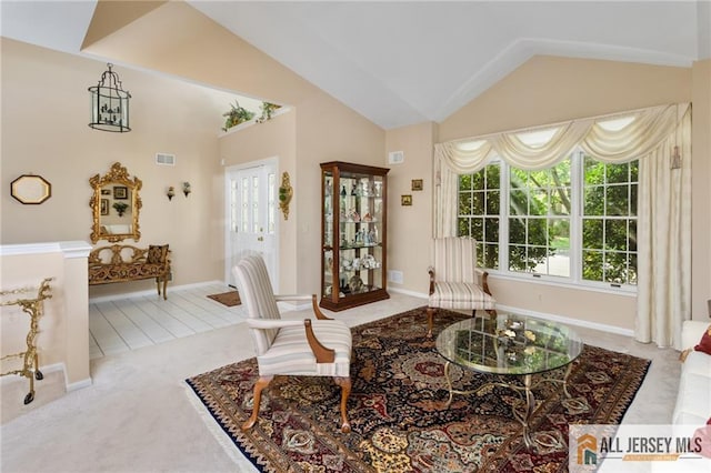 12 Wellfleet St, Monroe, NJ 08831 - living room featuring carpet flooring, lofted ceiling, and baseboards