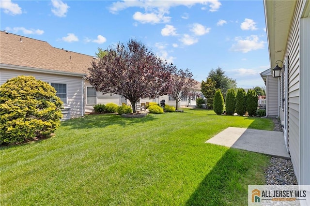 12 Wellfleet St, Monroe, NJ 08831 - view of grassy yard with a patio