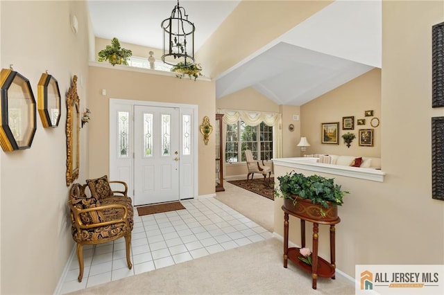 12 Wellfleet St, Monroe, NJ 08831 - tiled foyer entrance with carpet floors, baseboards, and high vaulted ceiling