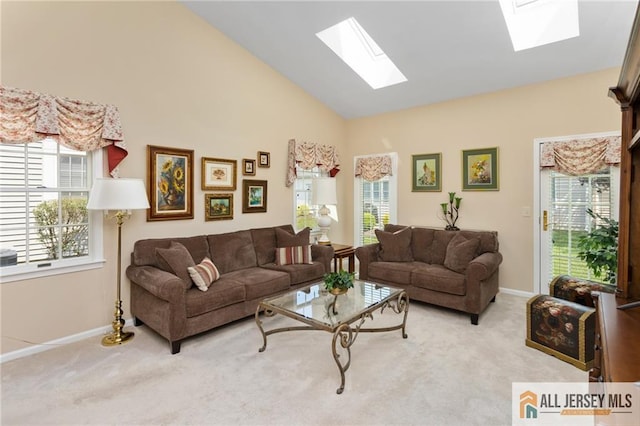 12 Wellfleet St, Monroe, NJ 08831 - carpeted living room with a skylight, baseboards, and high vaulted ceiling