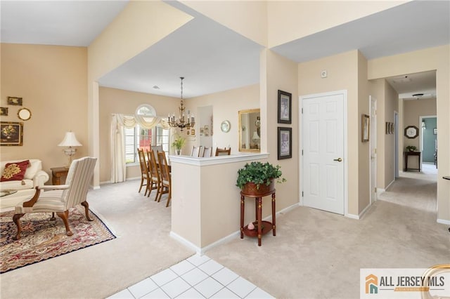12 Wellfleet St, Monroe, NJ 08831 - entrance foyer with light colored carpet, baseboards, and a chandelier