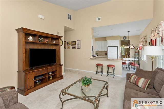 12 Wellfleet St, Monroe, NJ 08831 - living room featuring light colored carpet and baseboards