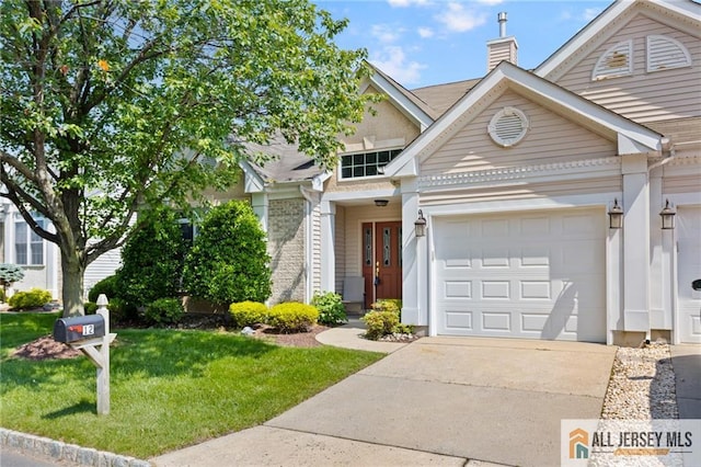 12 Wellfleet St, Monroe, NJ 08831 - view of front of property featuring a chimney, a garage, driveway, and a front yard