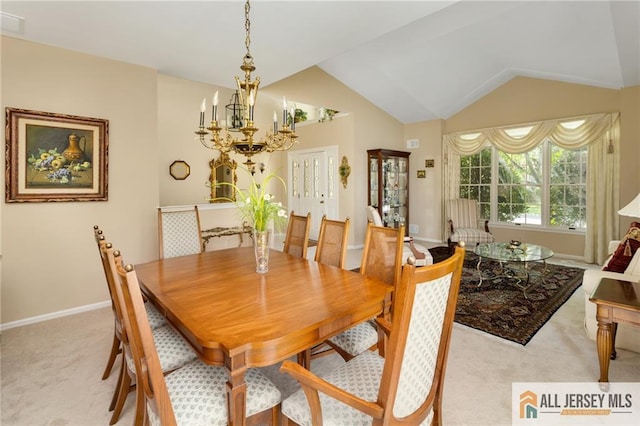 12 Wellfleet St, Monroe, NJ 08831 - dining space featuring light carpet, a chandelier, lofted ceiling, and baseboards