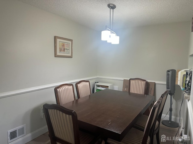 167 Rachel Ct, Franklin Twsp, NJ 08823 - dining room featuring a textured ceiling