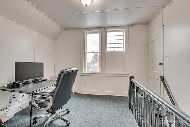 office area featuring vaulted ceiling and carpet flooring