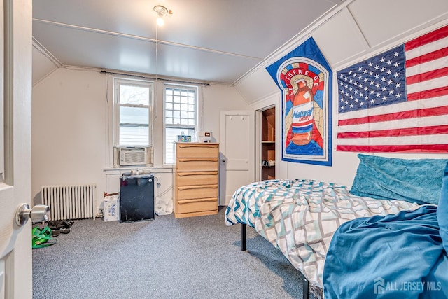 bedroom with lofted ceiling, radiator, cooling unit, and carpet flooring