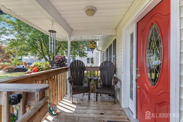 wooden deck with covered porch