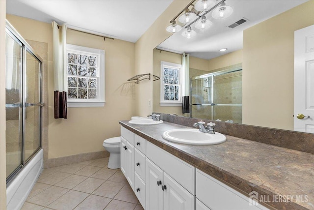 full bathroom featuring a wealth of natural light, visible vents, and a sink