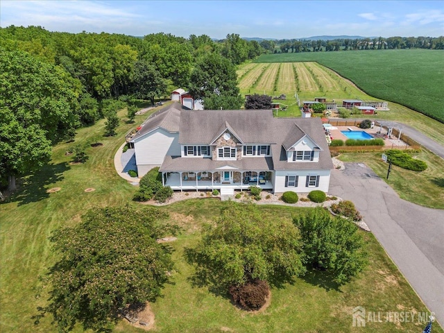 birds eye view of property featuring a rural view