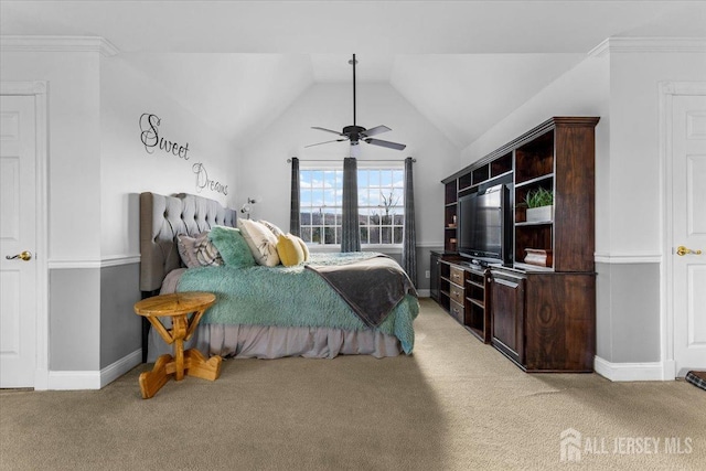 bedroom featuring light carpet, baseboards, a ceiling fan, and lofted ceiling