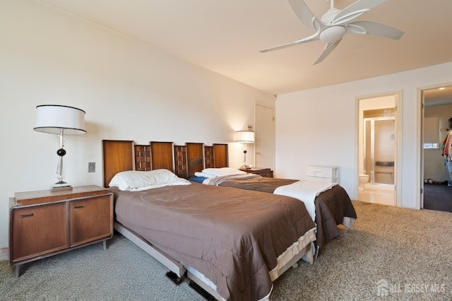 carpeted bedroom featuring ceiling fan and ensuite bathroom