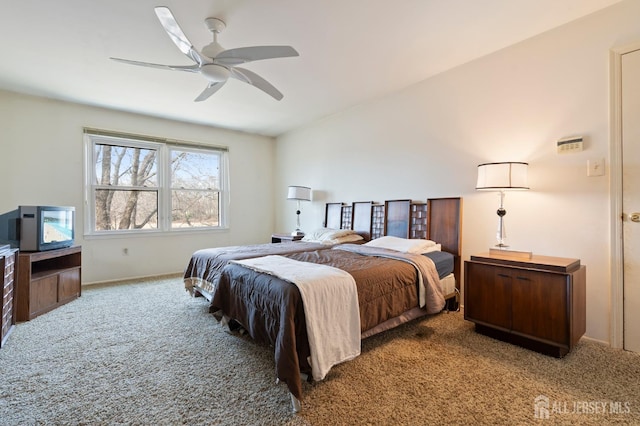 carpeted bedroom featuring a ceiling fan