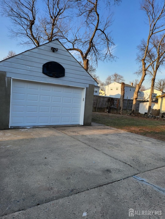 garage featuring fence