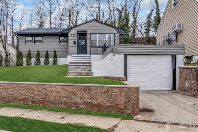 view of front of property with an attached garage, a front lawn, concrete driveway, and an AC wall unit