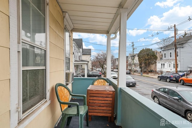 balcony featuring a residential view