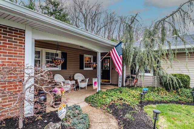 17 Morningside Dr, Old Bridge, NJ 08857 - property entrance featuring a porch and brick siding