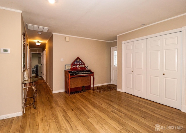 17 Morningside Dr, Old Bridge, NJ 08857 - entrance foyer featuring crown molding, baseboards, visible vents, and light wood-style floors