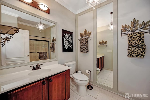 bathroom featuring ornamental molding, tile patterned flooring, vanity, and toilet