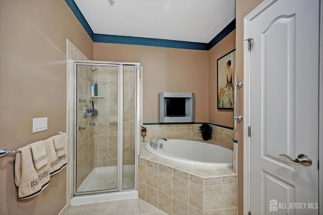 full bath with crown molding, a shower stall, a bath, and tile patterned floors