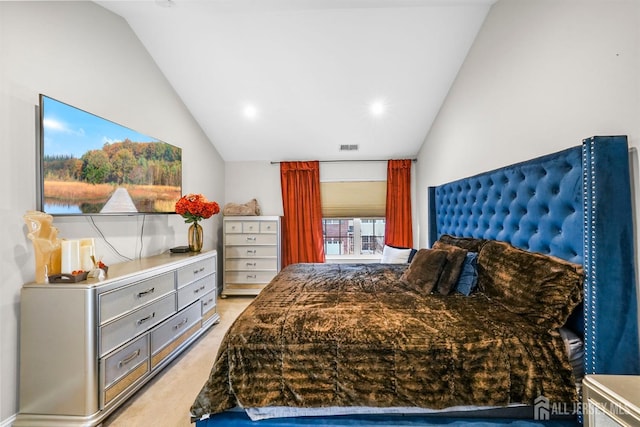 carpeted bedroom featuring vaulted ceiling