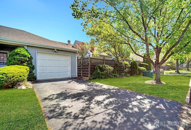view of side of home with driveway
