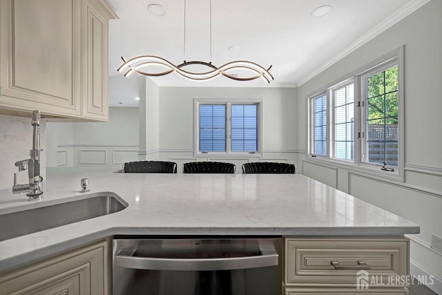 kitchen with dishwasher, crown molding, a sink, cream cabinetry, and light stone counters