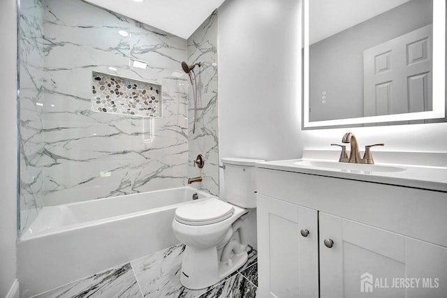 full bathroom featuring toilet, vanity, bathing tub / shower combination, and marble finish flooring