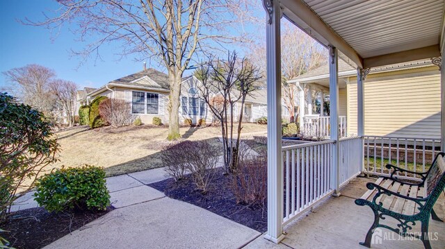 view of patio featuring a porch