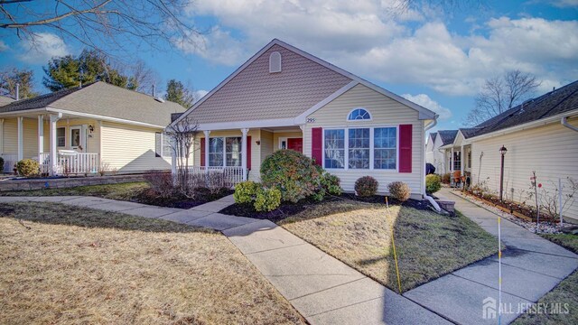 bungalow-style house featuring a front yard and a porch