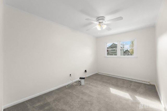 46 Thomas St, Monroe, NJ 08831 - carpeted spare room with a baseboard radiator, a ceiling fan, baseboards, and crown molding