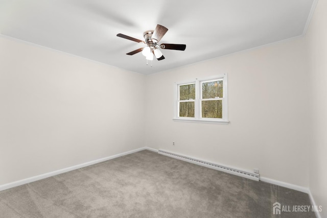 46 Thomas St, Monroe, NJ 08831 - carpeted spare room with a baseboard radiator, baseboards, ceiling fan, and crown molding