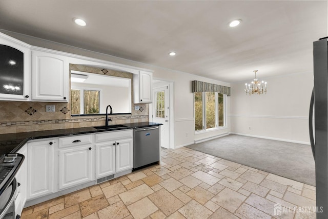 46 Thomas St, Monroe, NJ 08831 - kitchen with stainless steel appliances, a sink, dark countertops, plenty of natural light, and recessed lighting