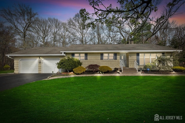 46 Thomas St, Monroe, NJ 08831 - ranch-style house with driveway, an attached garage, and a yard