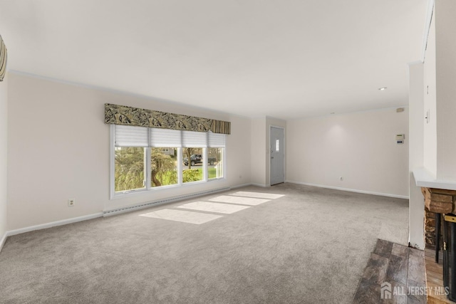 46 Thomas St, Monroe, NJ 08831 - unfurnished living room featuring carpet flooring, baseboards, and a fireplace