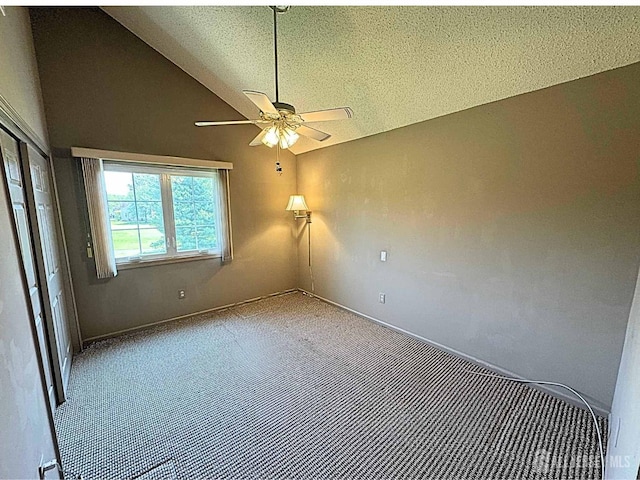 38 Rutland Ln Unit I, Monroe, NJ 08831 - unfurnished room with carpet, lofted ceiling, ceiling fan, baseboards, and a textured ceiling