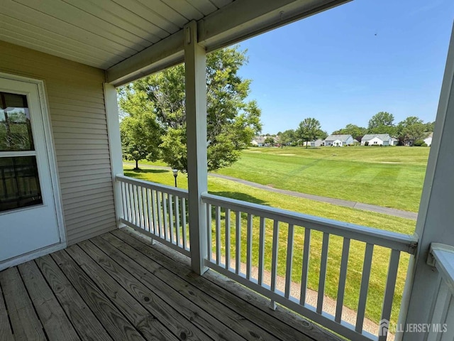 38 Rutland Ln Unit I, Monroe, NJ 08831 - wooden porch featuring a lawn
