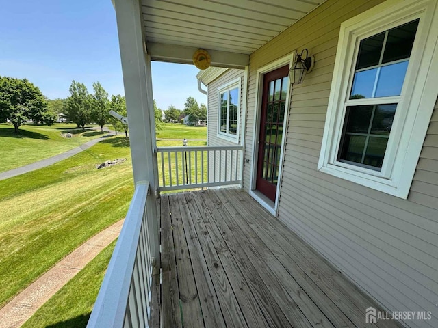 38 Rutland Ln Unit I, Monroe, NJ 08831 - wooden porch featuring a yard