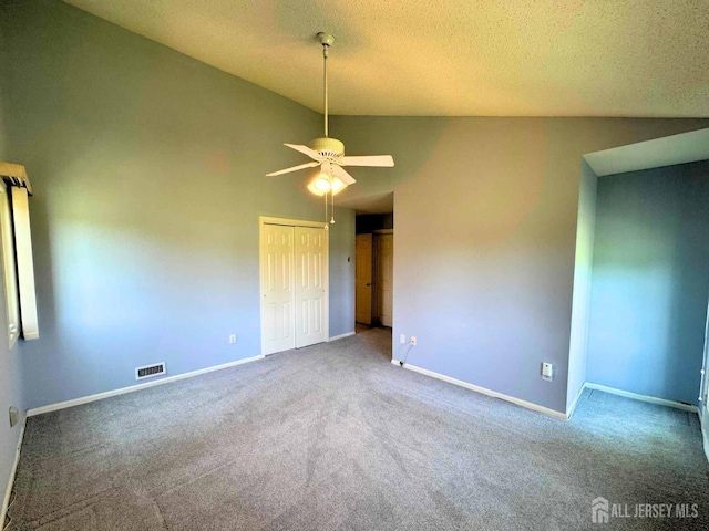 38 Rutland Ln Unit I, Monroe, NJ 08831 - carpeted spare room featuring lofted ceiling, ceiling fan, baseboards, and a textured ceiling