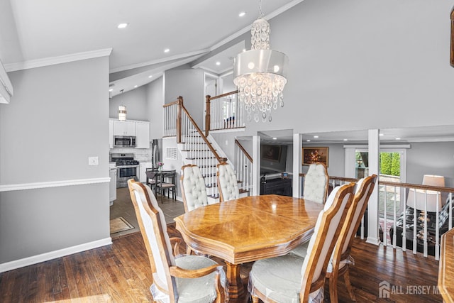 59 Mckinley Ave, Colonia, NJ 07067 - dining area with ornamental molding, a chandelier, high vaulted ceiling, stairway, and baseboards