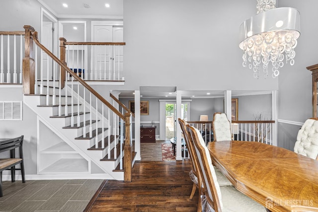 59 Mckinley Ave, Colonia, NJ 07067 - dining area featuring a towering ceiling, wood finished floors, recessed lighting, stairway, and a chandelier