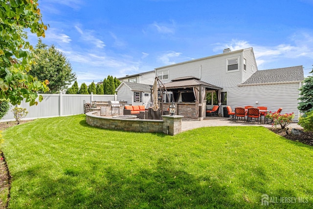59 Mckinley Ave, Colonia, NJ 07067 - back of property featuring a gazebo, a patio area, and an outdoor living space