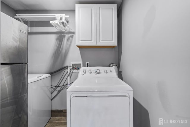 59 Mckinley Ave, Colonia, NJ 07067 - washroom with cabinet space, washer and dryer, and wood finished floors