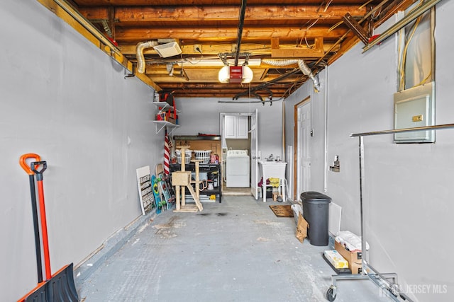 59 Mckinley Ave, Colonia, NJ 07067 - below grade area featuring electric panel, washer and dryer, a garage, and a sink
