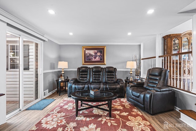 59 Mckinley Ave, Colonia, NJ 07067 - living area featuring wood finished floors, crown molding, recessed lighting, and baseboards