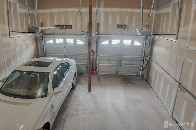 47 Bay Hill Blvd, Monroe, NJ 08831 - garage featuring washer / clothes dryer and a garage door opener