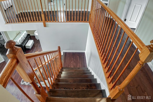 47 Bay Hill Blvd, Monroe, NJ 08831 - stairway with wood finished floors and a towering ceiling