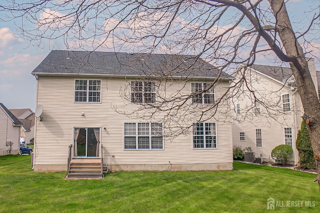 47 Bay Hill Blvd, Monroe, NJ 08831 - rear view of house featuring entry steps and a lawn