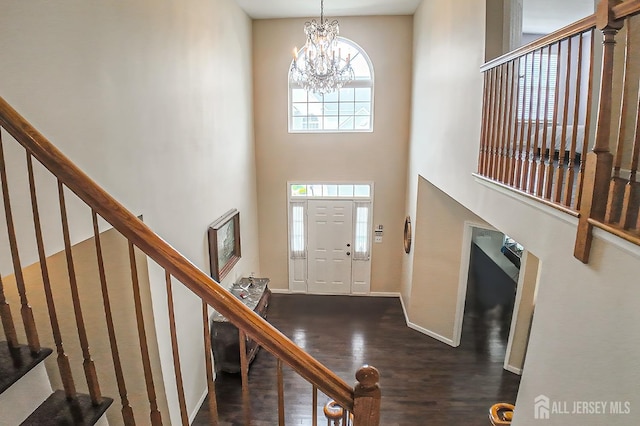 47 Bay Hill Blvd, Monroe, NJ 08831 - foyer featuring stairs, plenty of natural light, a chandelier, wood finished floors, and a towering ceiling